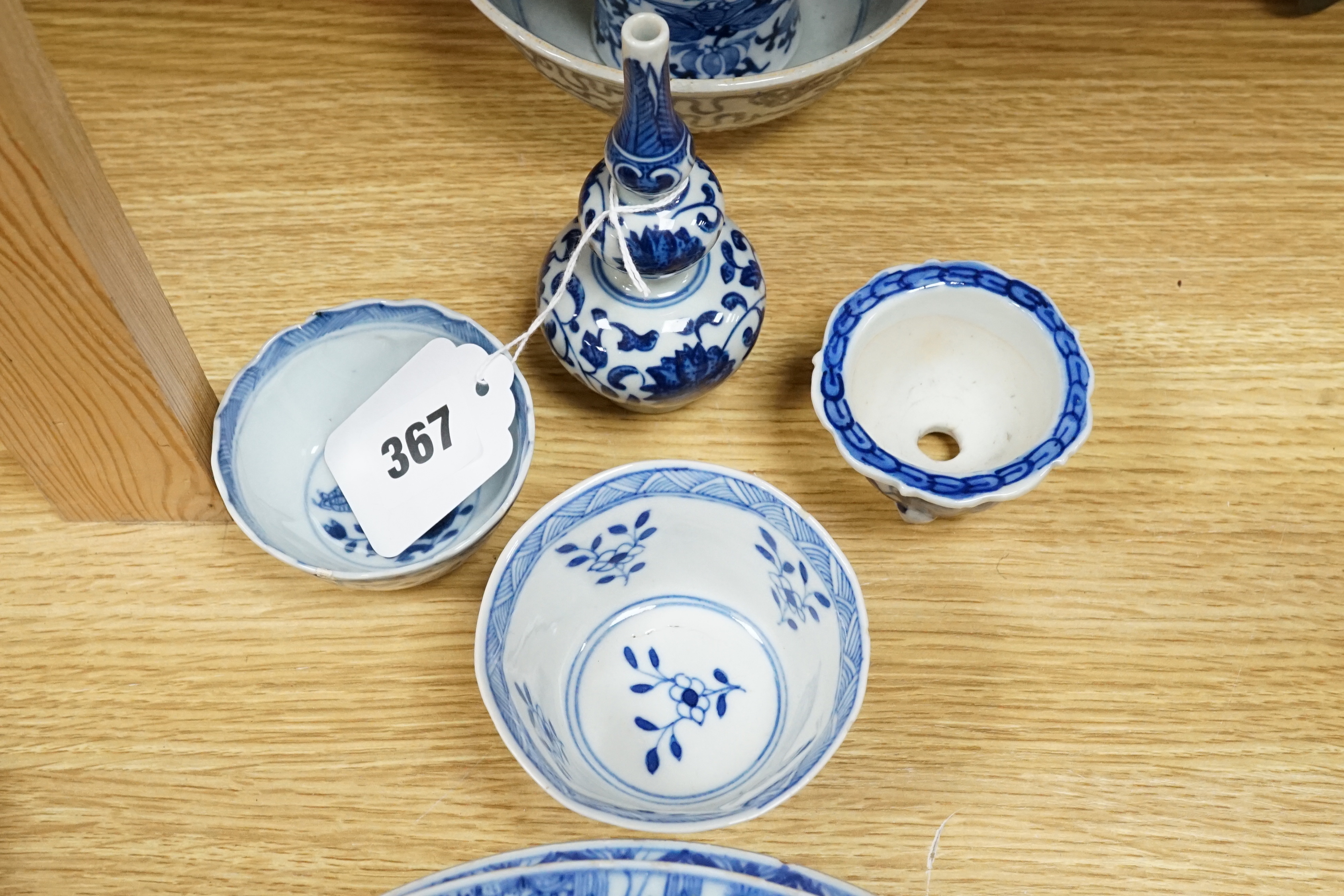 A quantity of blue and white Chinese porcelain dishes and vessels, 18th century and later, tallest 22.5cm